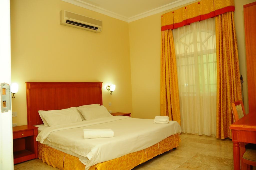 Al Faisal Hotel Suites Sur Ruang foto